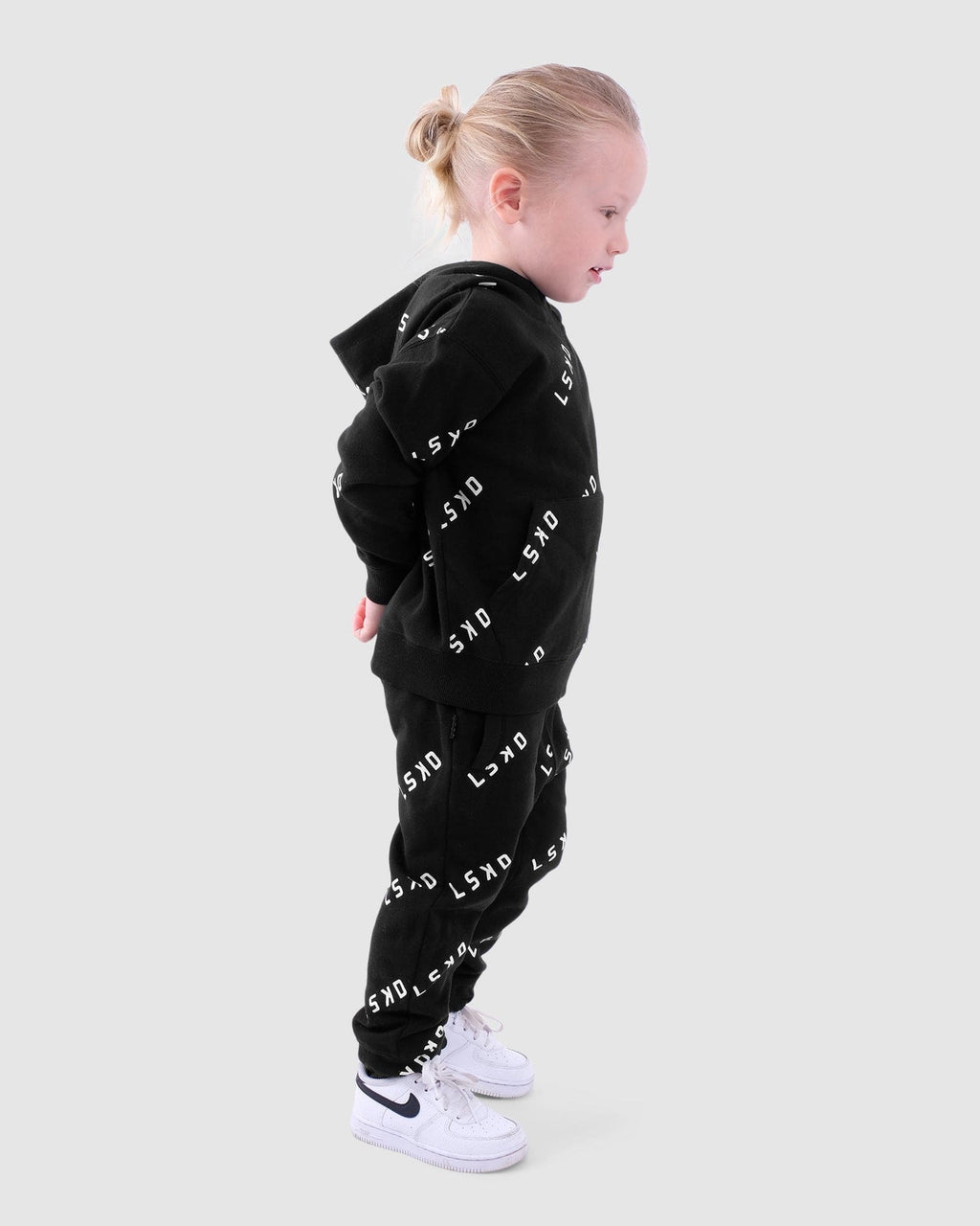 Model wearing Duplicate Track Pants (00-8) - Black