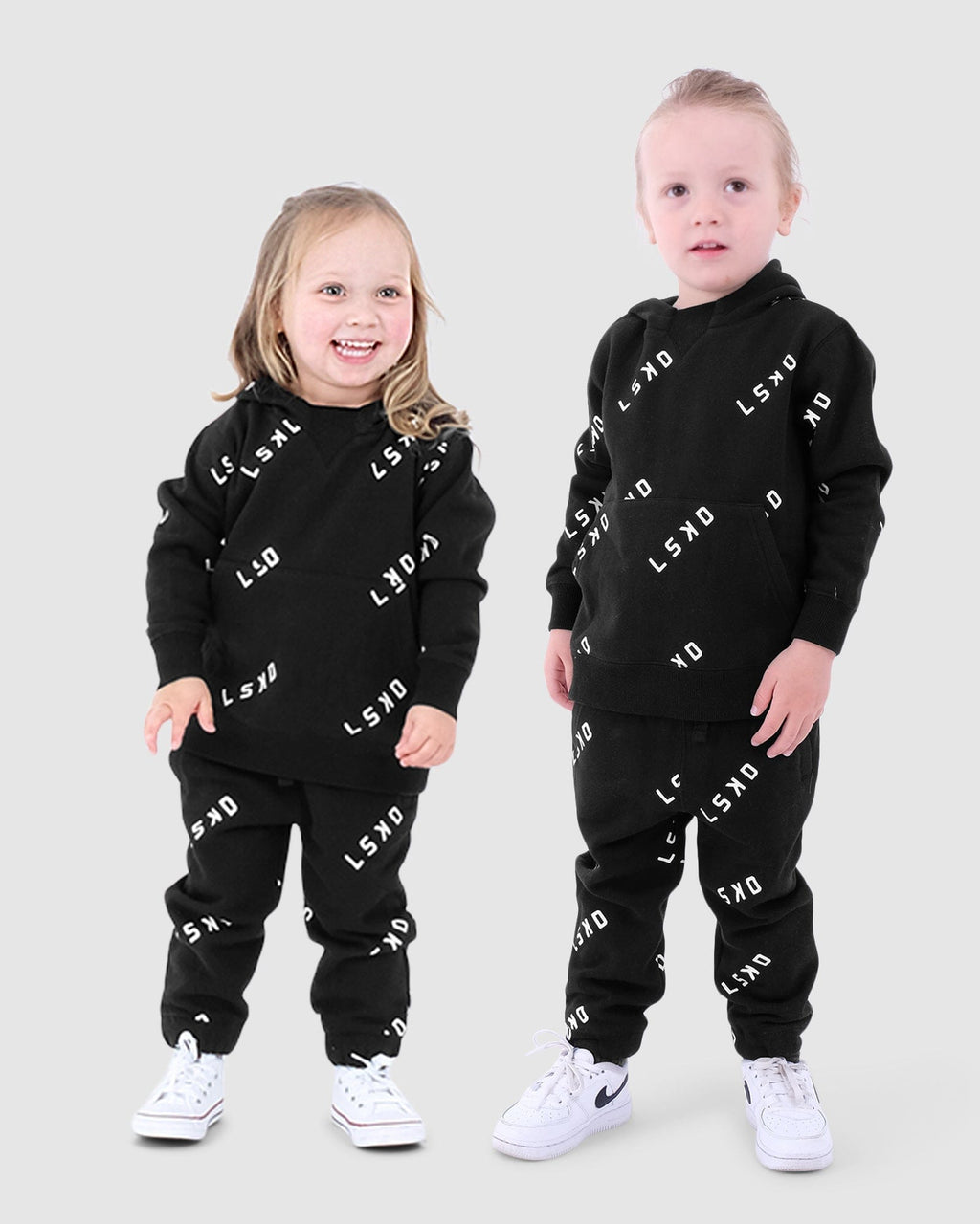 Model wearing Duplicate Track Pants (00-8) - Black