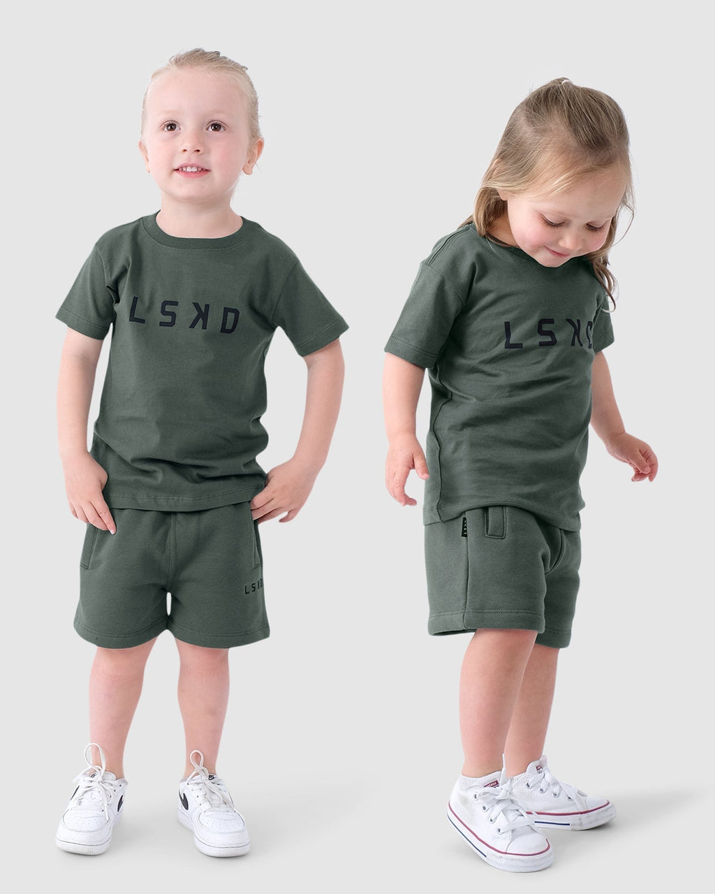 Model wearing Essential Track Shorts (00-8) - Carbon Green