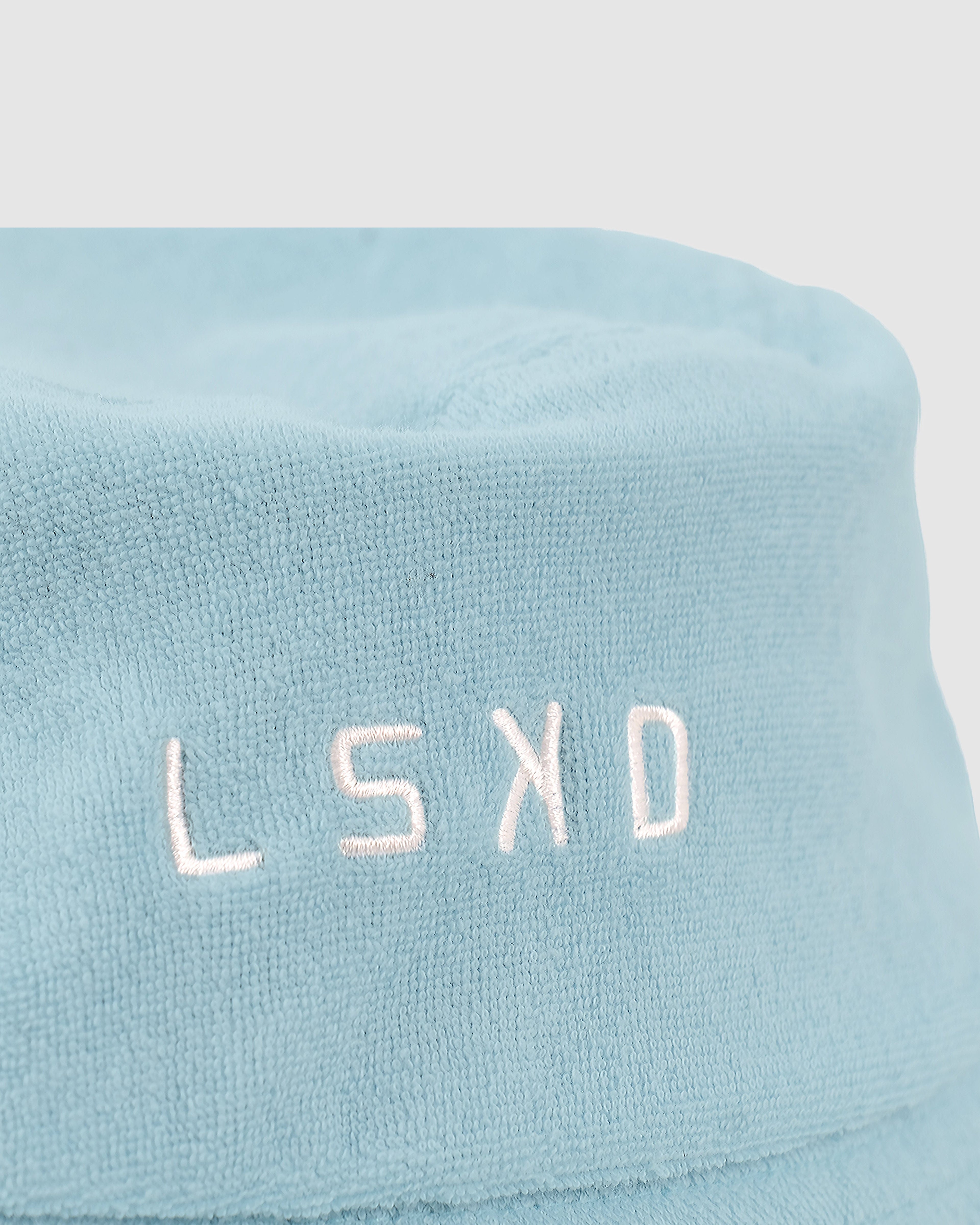 Model wearing Field Bucket Hat - Blue