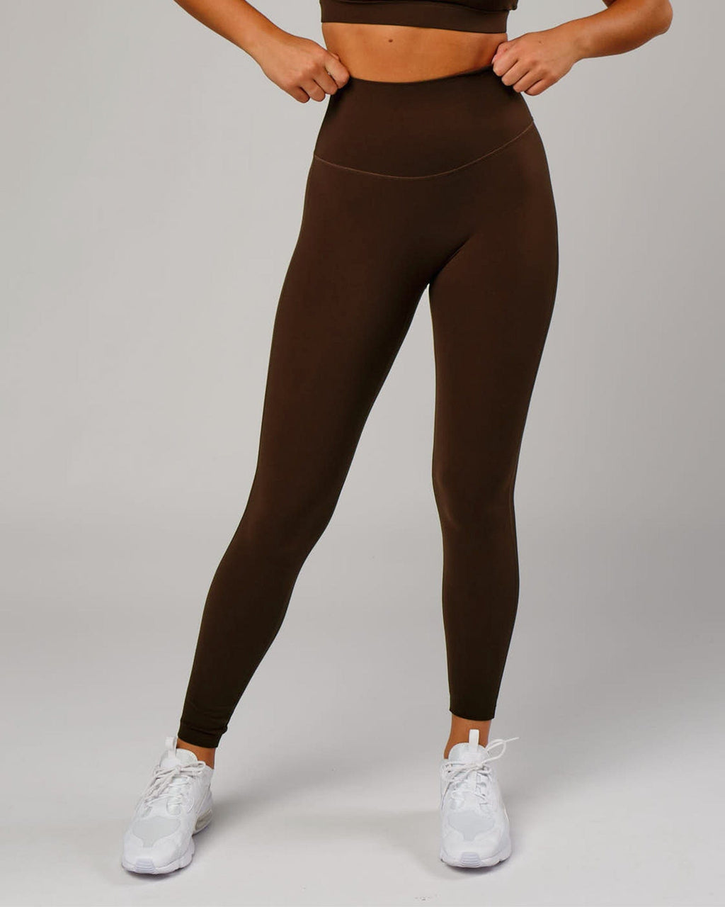 Model wearing Elixir Full Length Tight - Chocolate No Logo