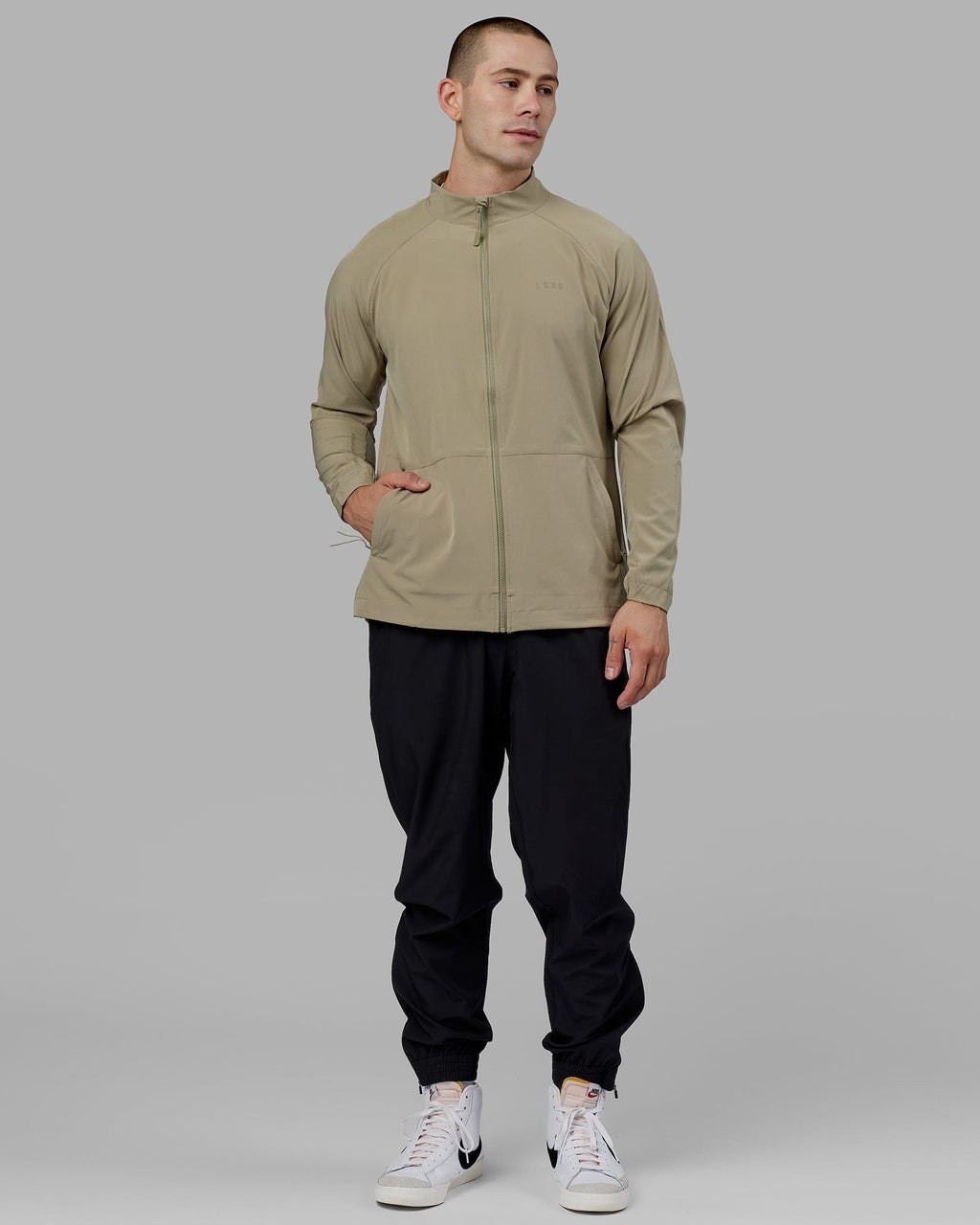 Model wearing Energy Stretch Performance Jacket - Laurel Oak