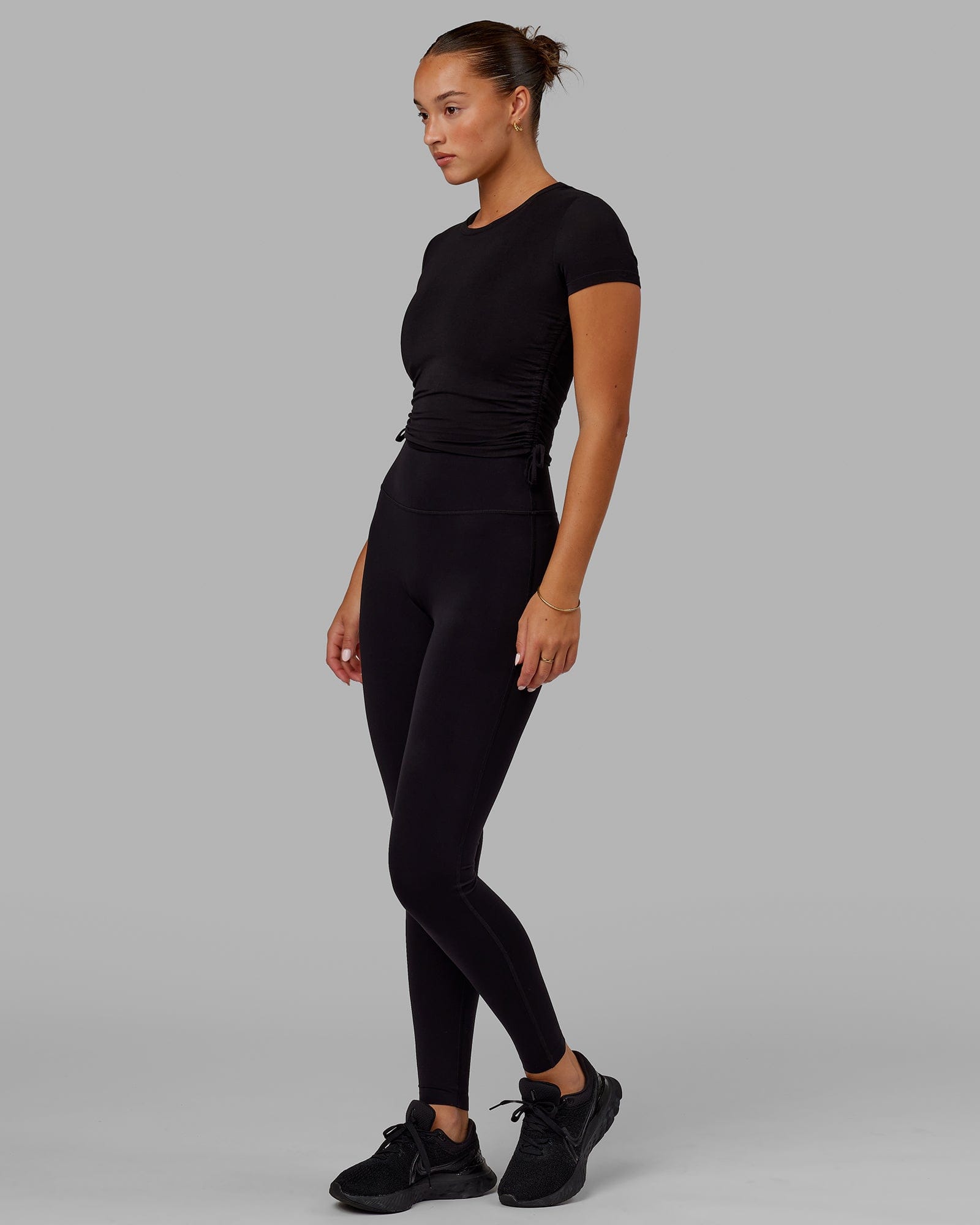 Model wearing Kick On Cropped Tee - Black