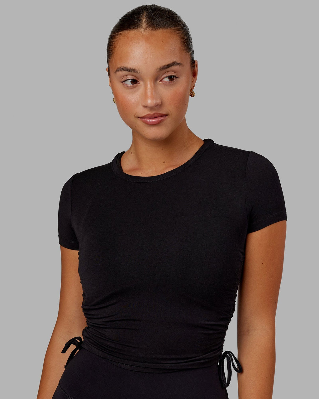 Model wearing Kick On Cropped Tee - Black