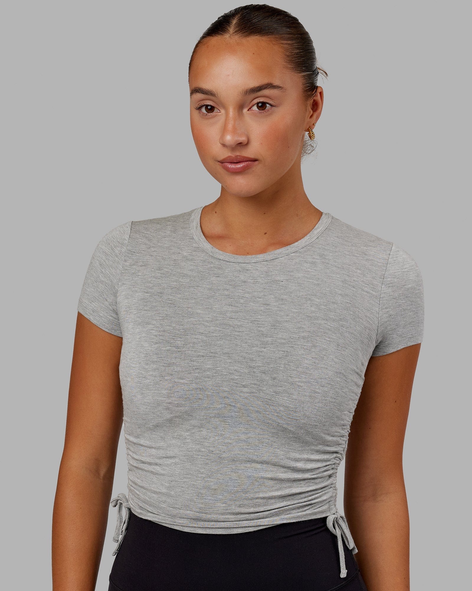 Model wearing Kick On Cropped Tee - Lt Grey Marl