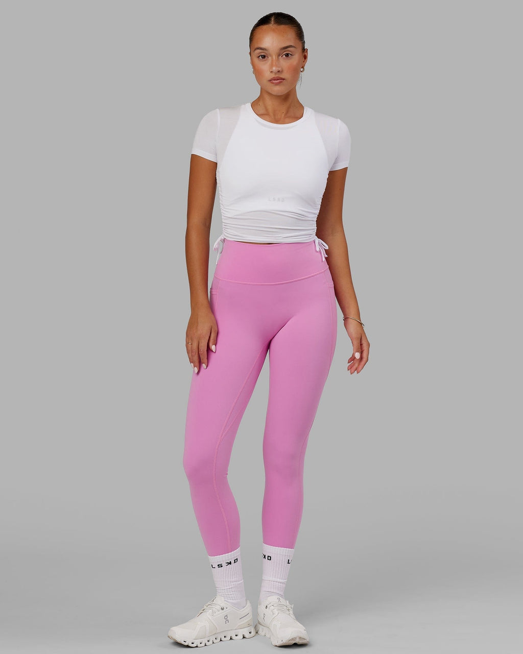 Model wearing Kick On Cropped Tee - White