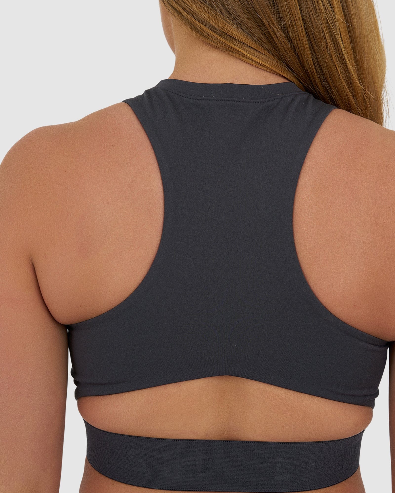 Model wearing Competition Sports Bra - Asphalt