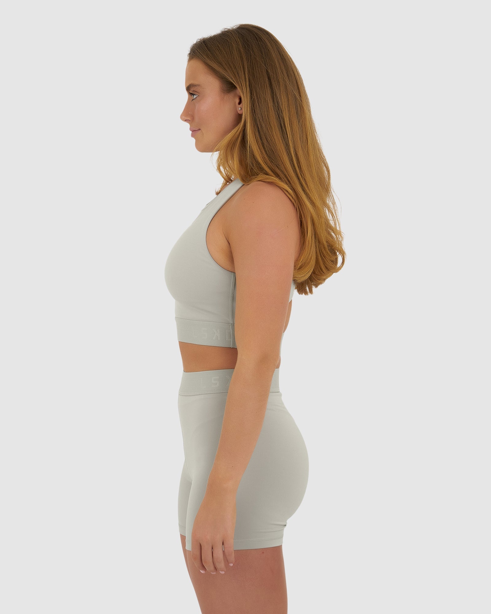 Model wearing Competition Sports Bra - Pussywillow