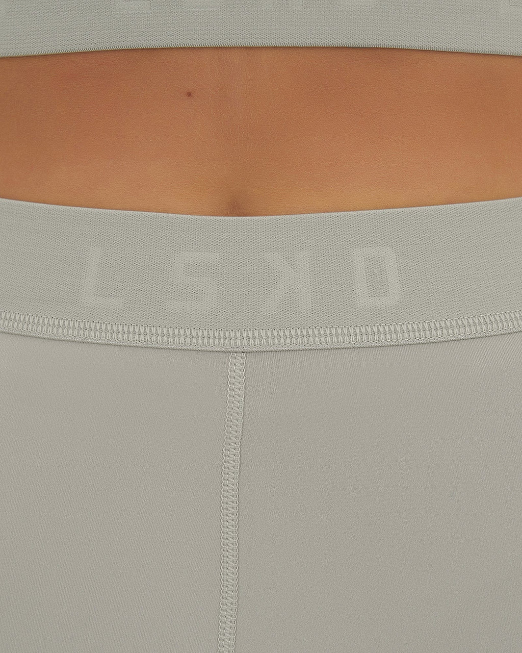 Model wearing Competition X-Short Tight - Pussywillow