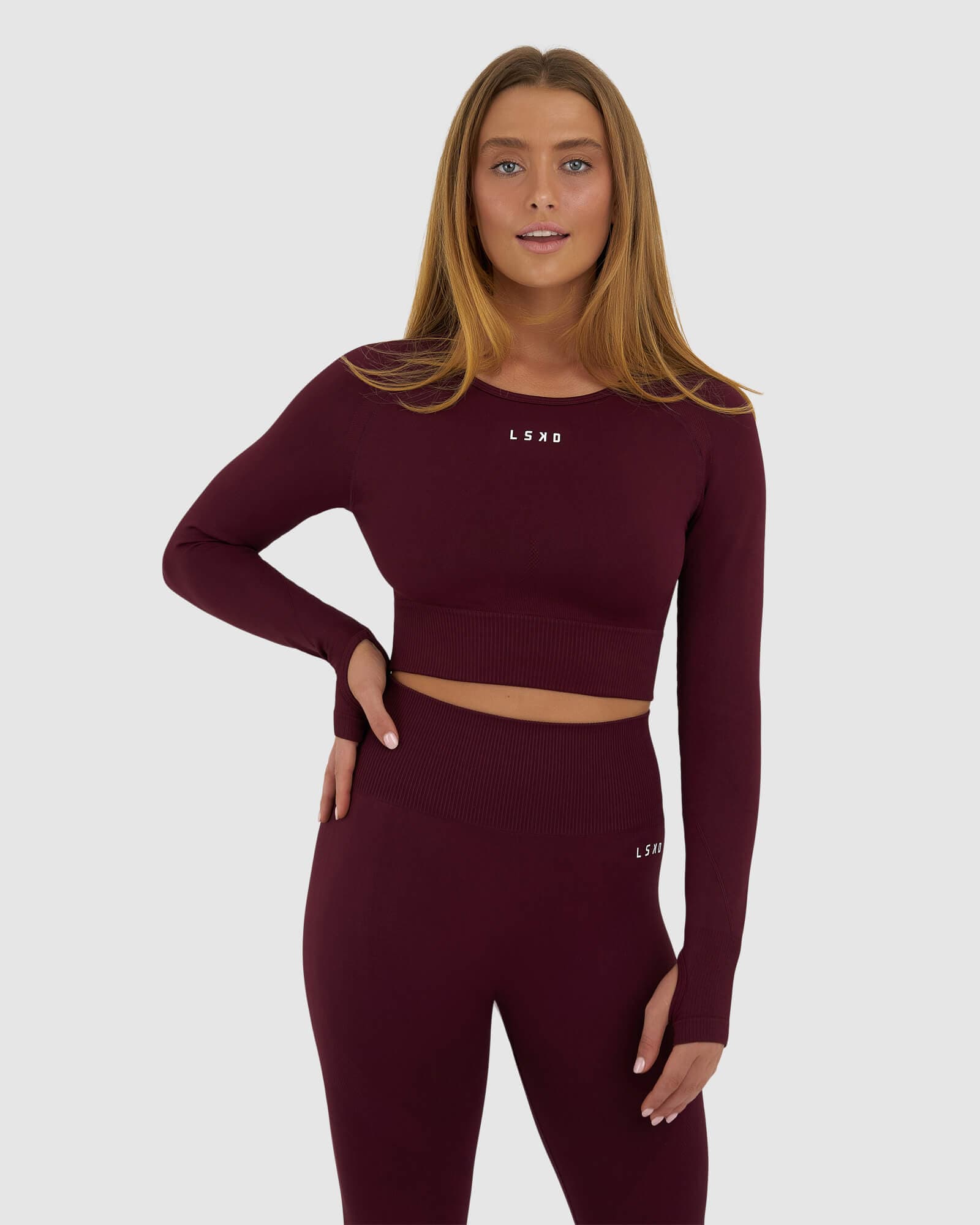 Model wearing Seamless LS Top - Wine