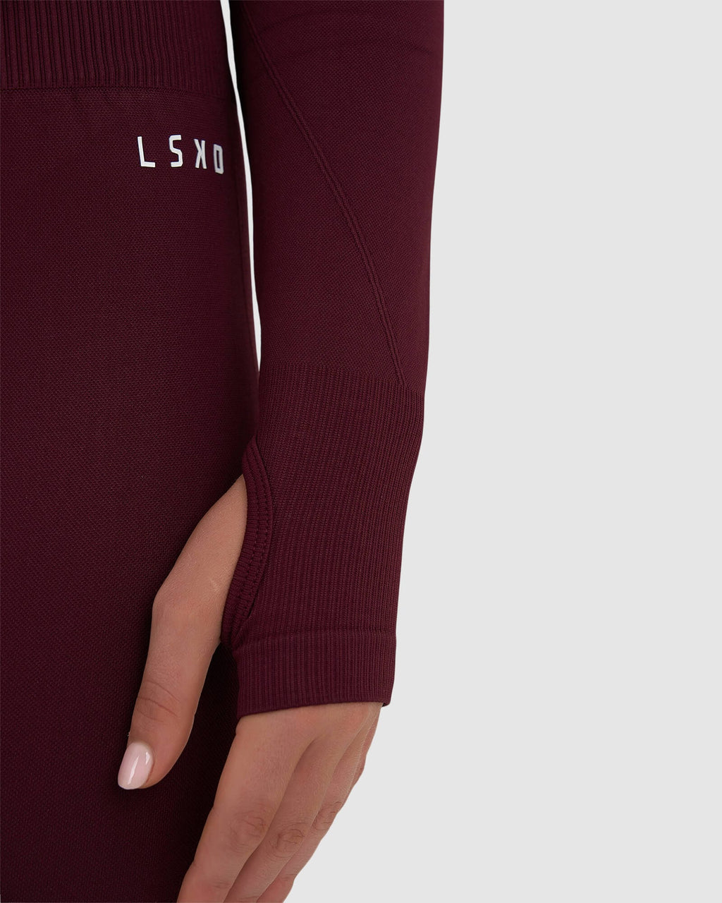 Model wearing Seamless LS Top - Wine
