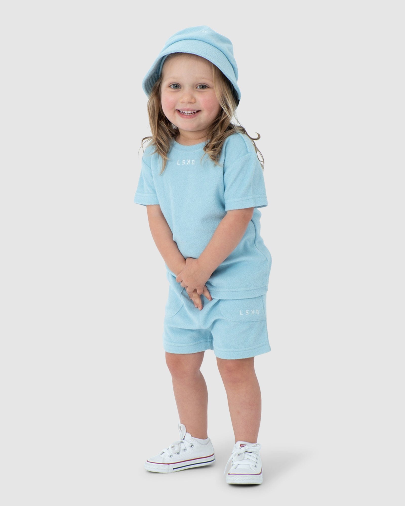 Model wearing Field Tee (00-8) - Blue