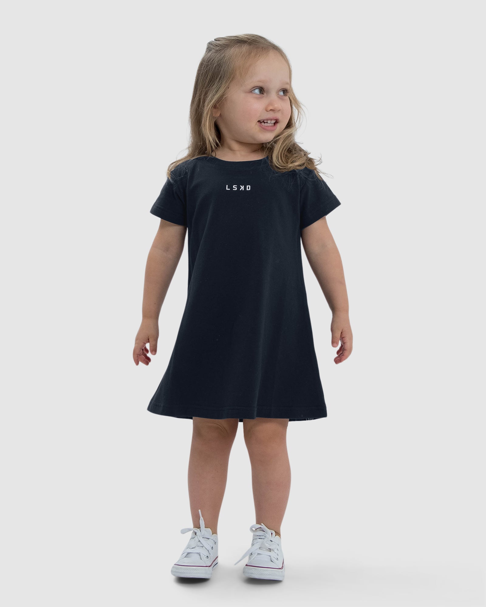 Model wearing Base Tee Dress (00-8) - Carbon