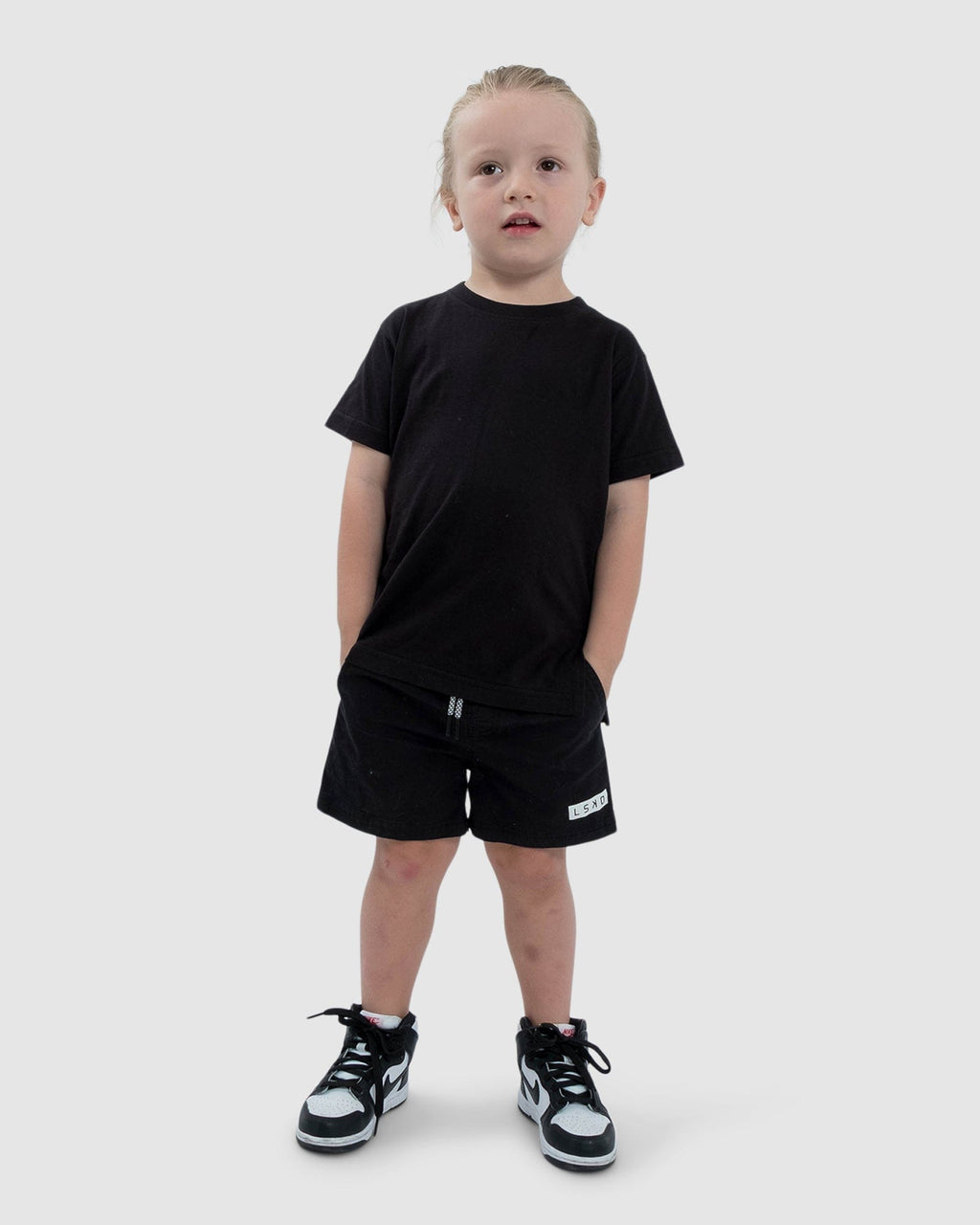 Model wearing Tab Tee (00-8) - Black