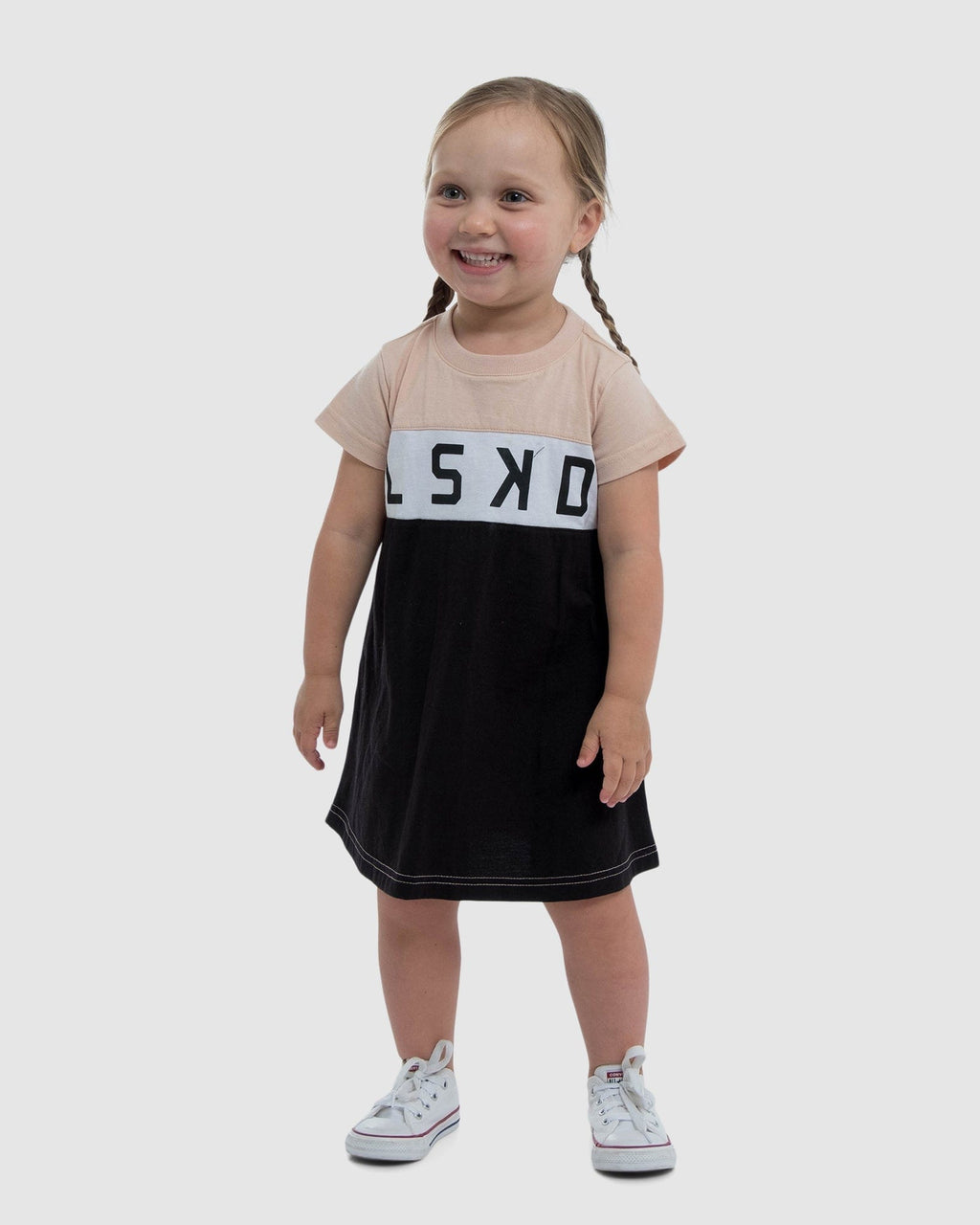 Model wearing Dough Tee Dress (00-6) - Blush-Black