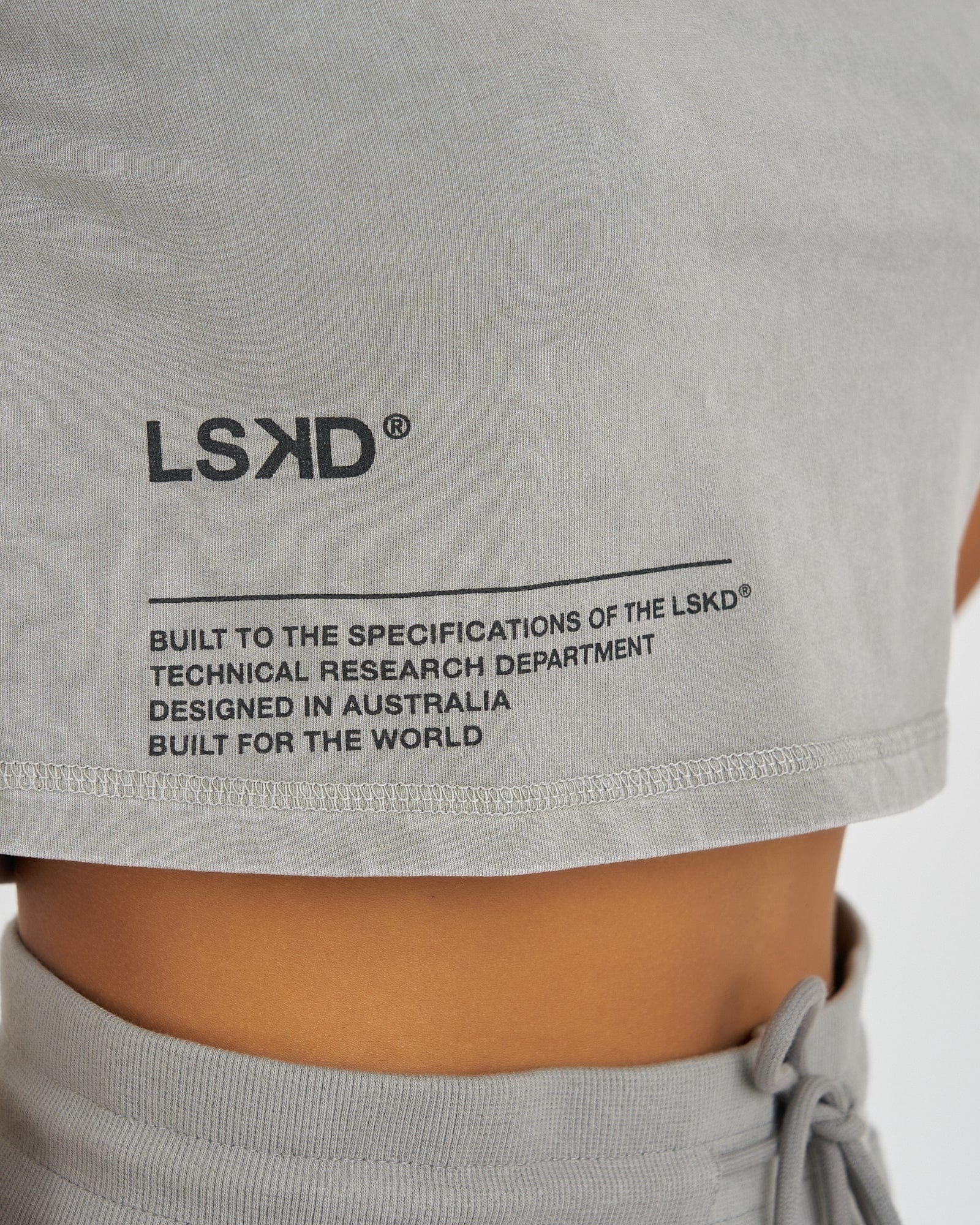 Model wearing Crew Crop Tee - Pigment Pewter