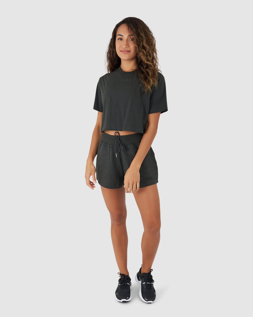 Model wearing Field Crop Tee - Pirate Black