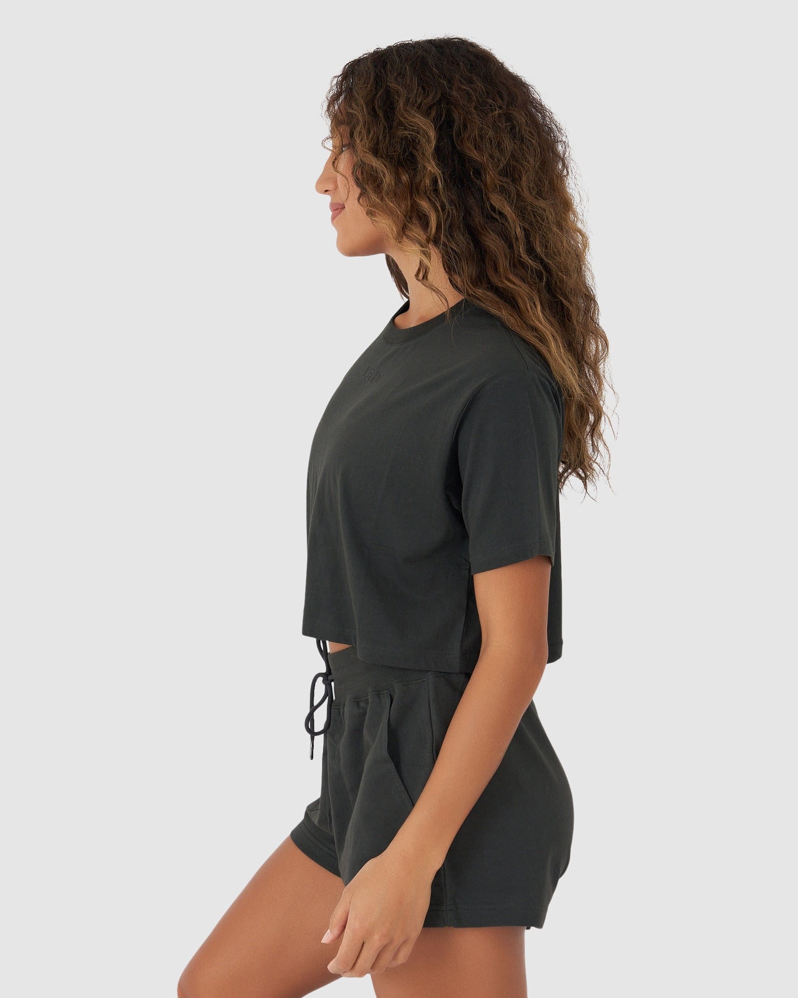 Model wearing Field Crop Tee - Pirate Black