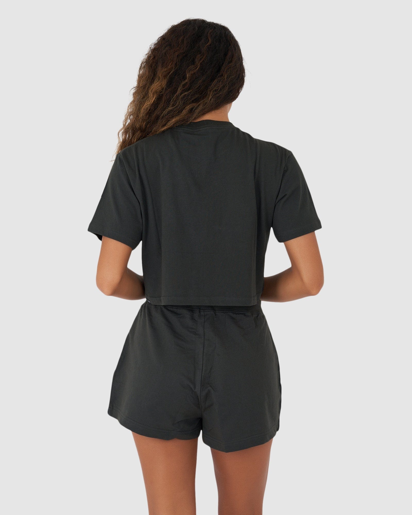 Model wearing Field Crop Tee - Pirate Black