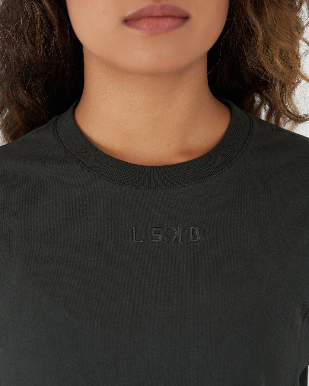 Model wearing Field Crop Tee - Pirate Black