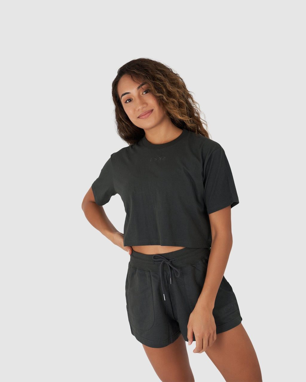 Model wearing Field Crop Tee - Pirate Black