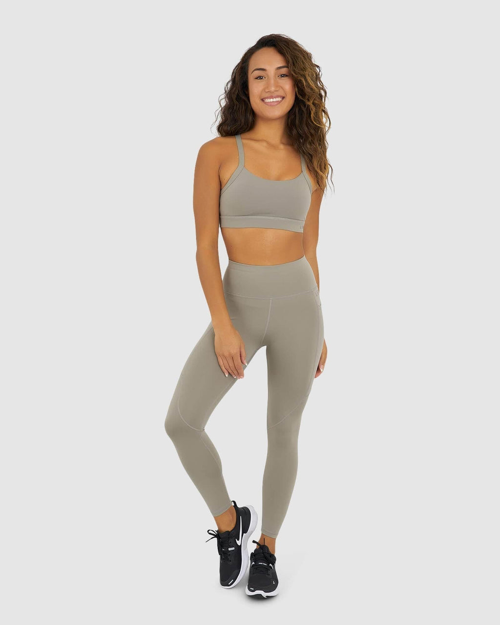 Model wearing Momentum Sports Bra - Gravity