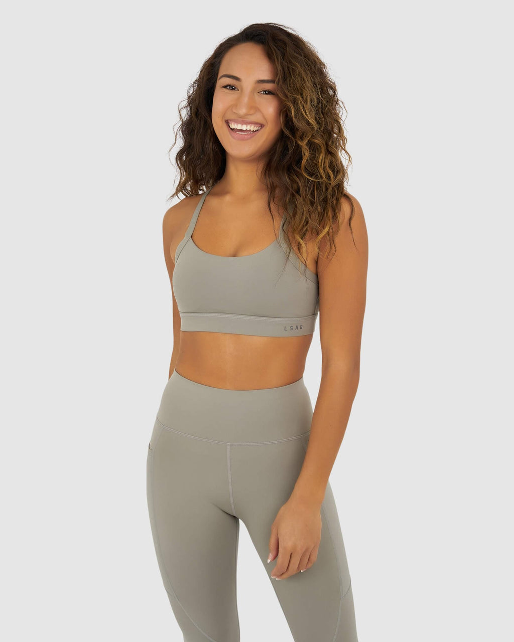 Model wearing Momentum Sports Bra - Gravity