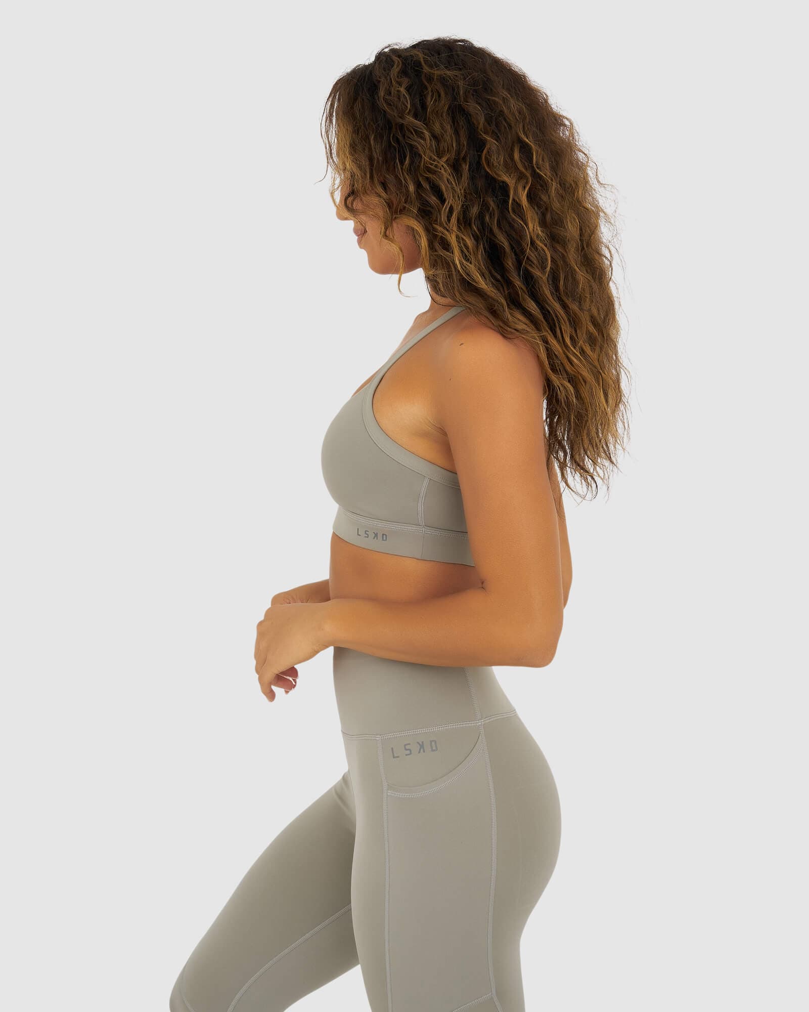 Model wearing Momentum Sports Bra - Gravity