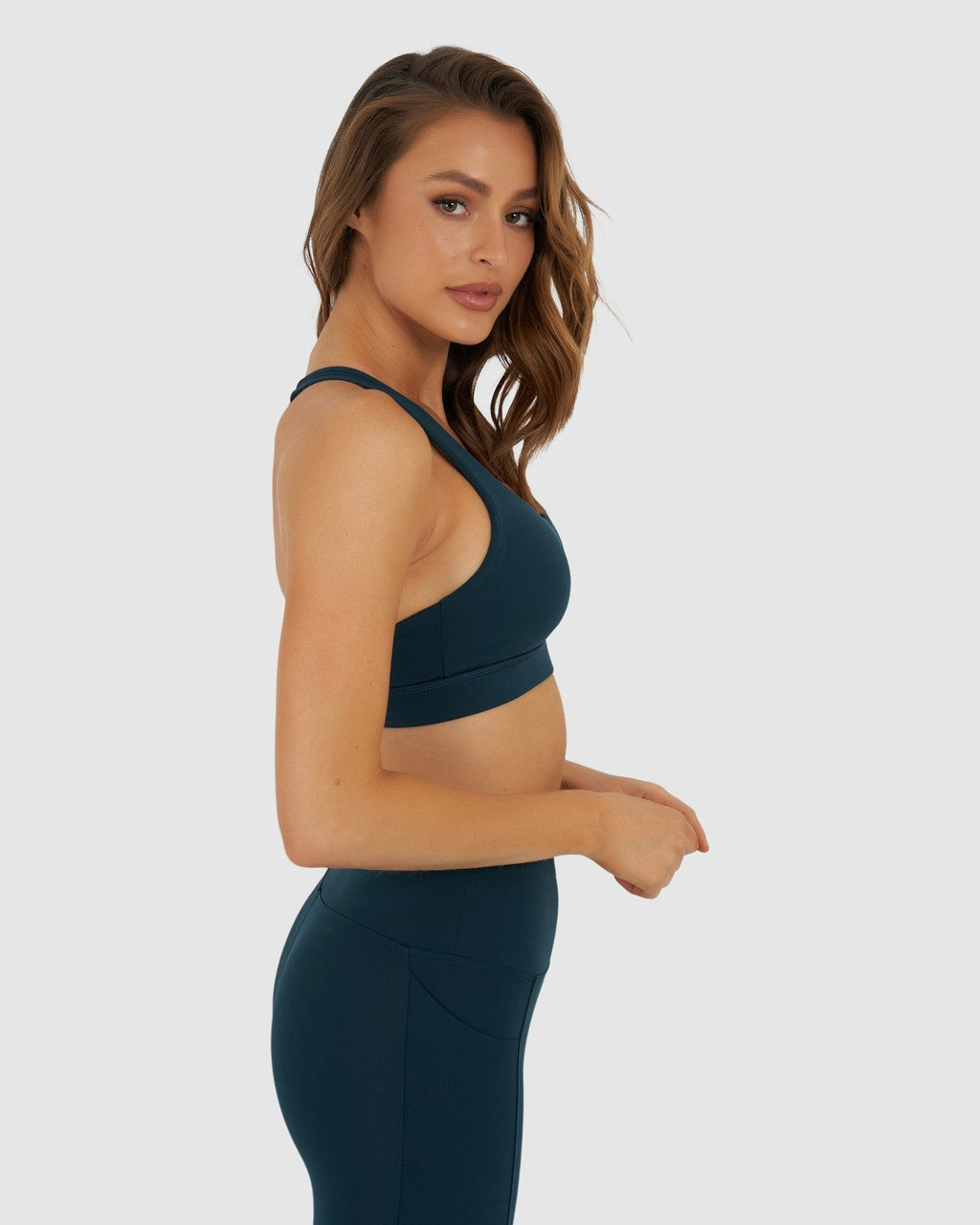 Model wearing Rep Sports Bra Small Logo - Deep Teal