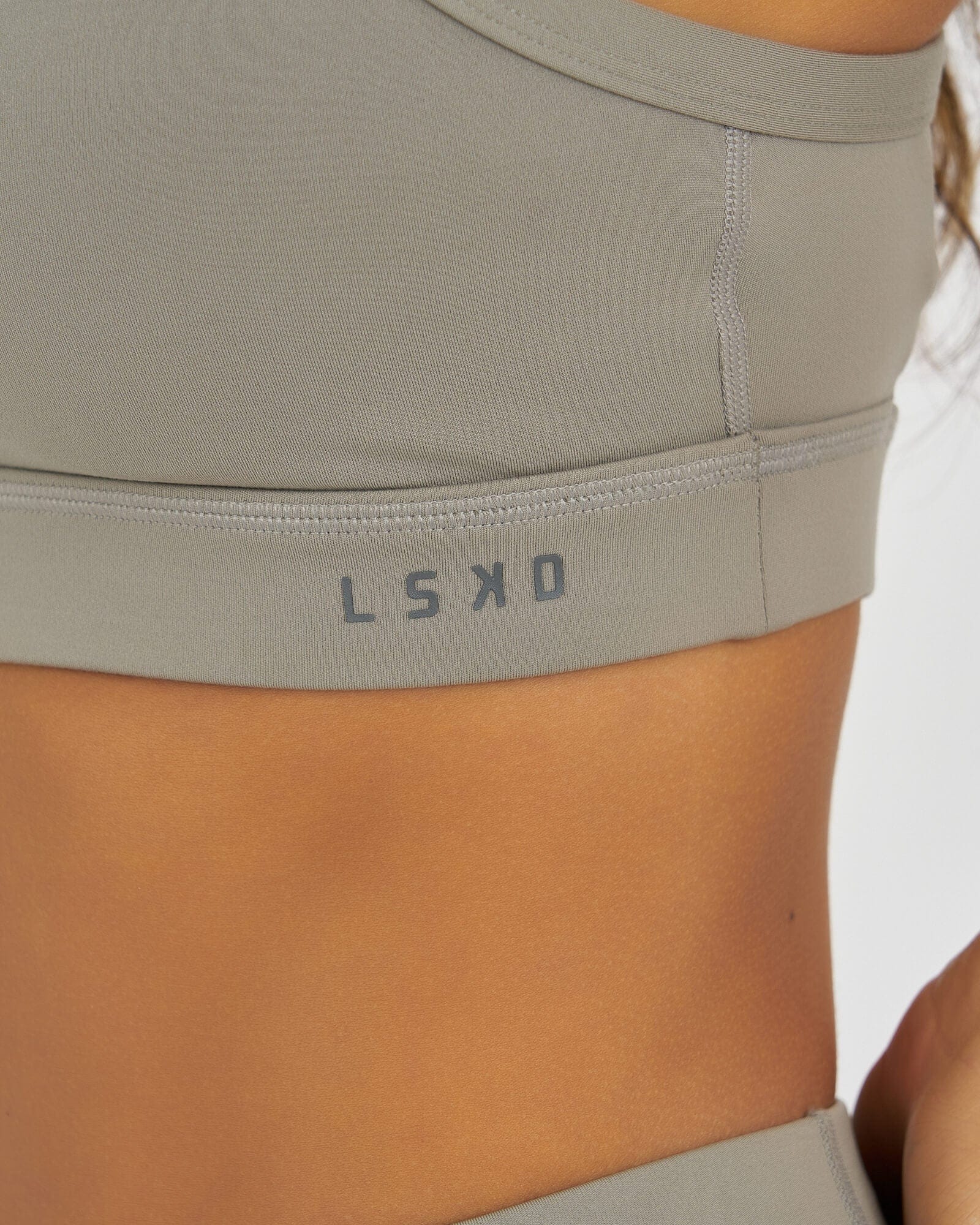 Model wearing Momentum Sports Bra - Gravity