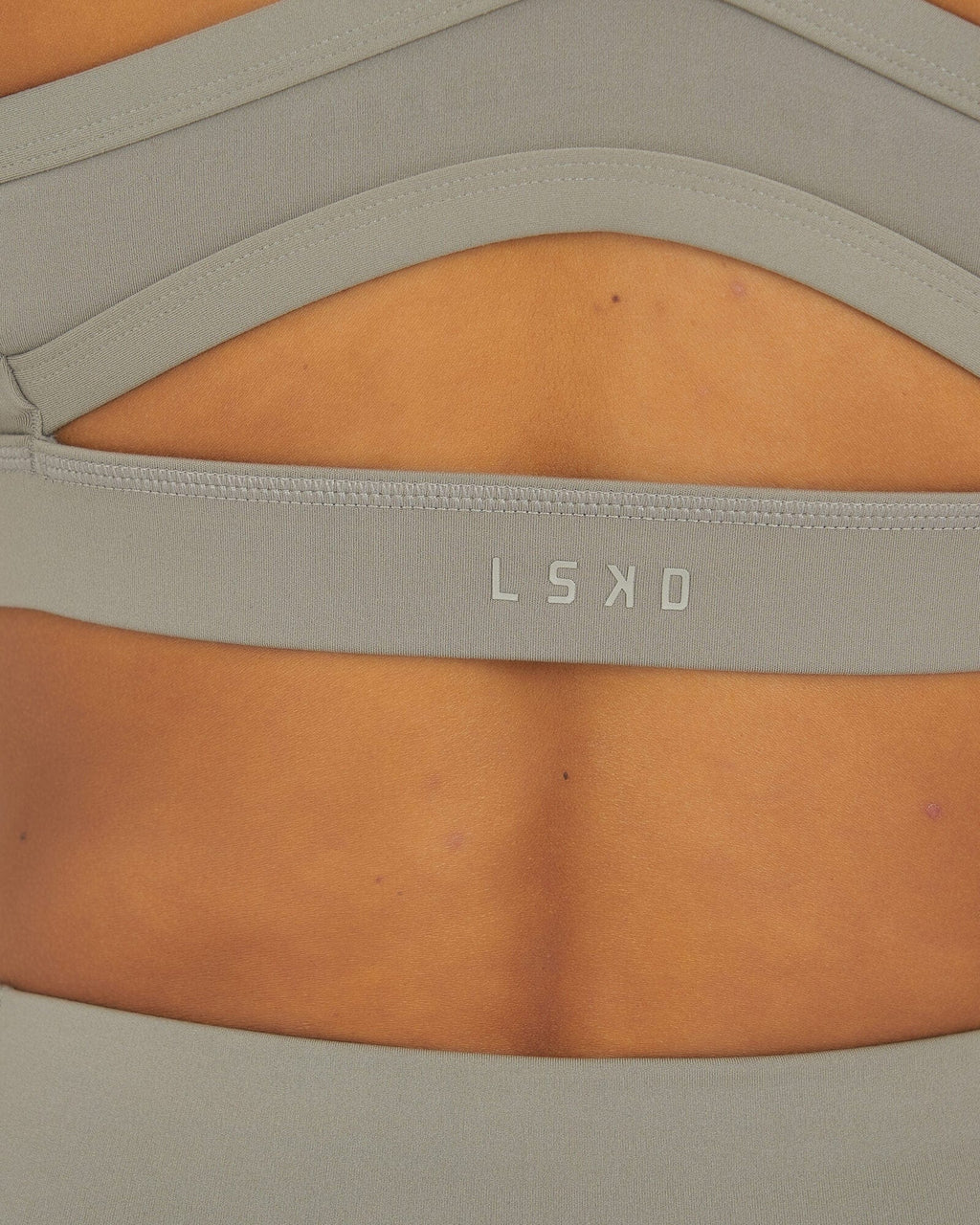 Model wearing Momentum Sports Bra - Gravity