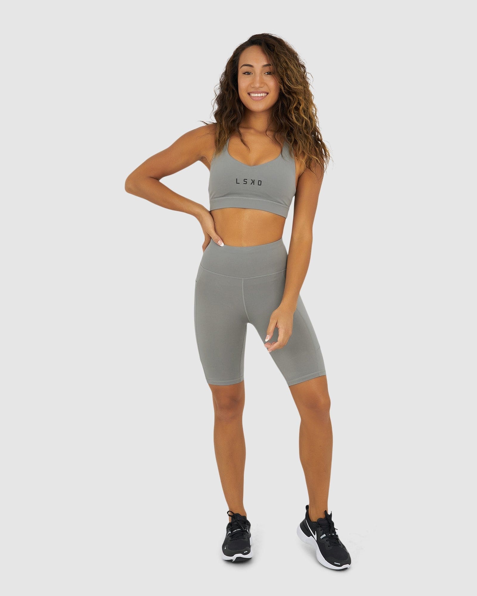 Model wearing Rep Short Tight Small Logo - Frost Grey