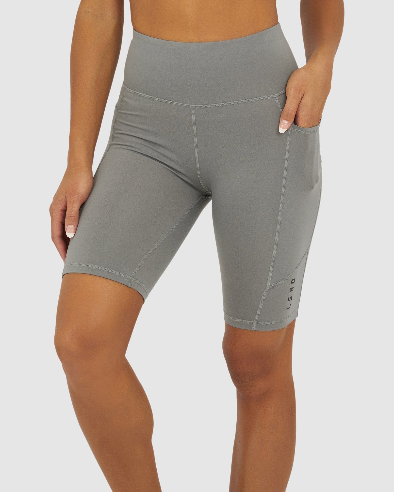 Model wearing Rep Short Tight Small Logo - Frost Grey