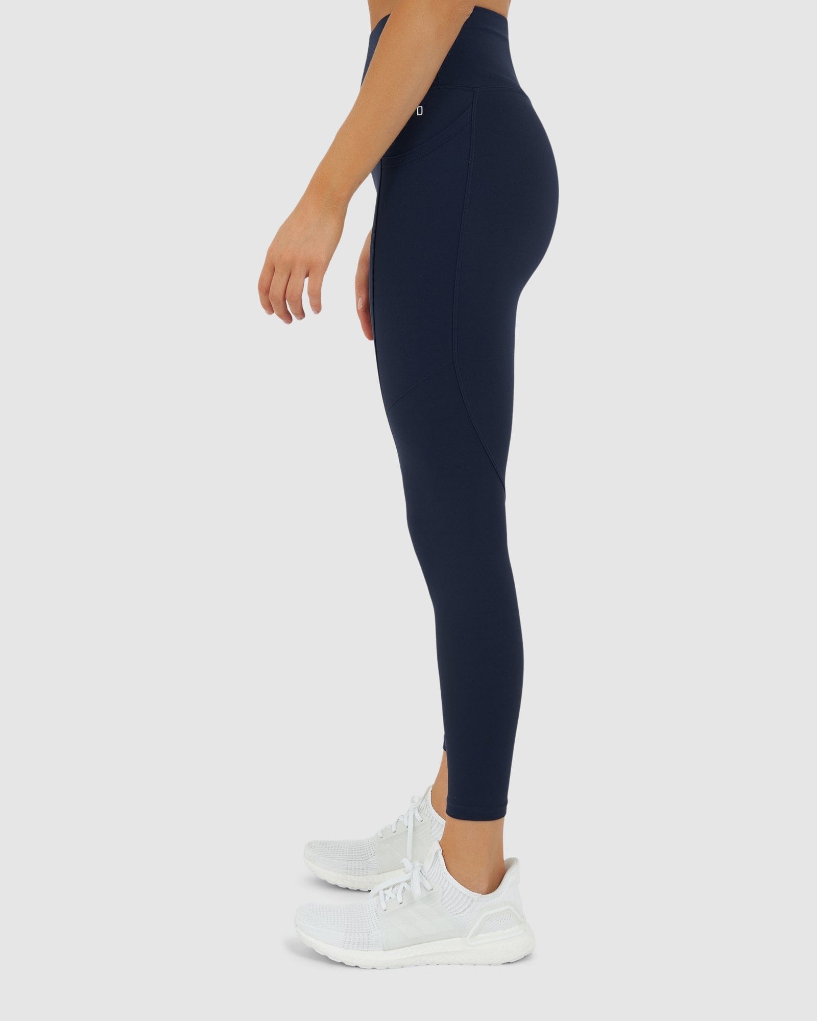 Model wearing Rep 7/8 Length Tight Small Logo - Navy