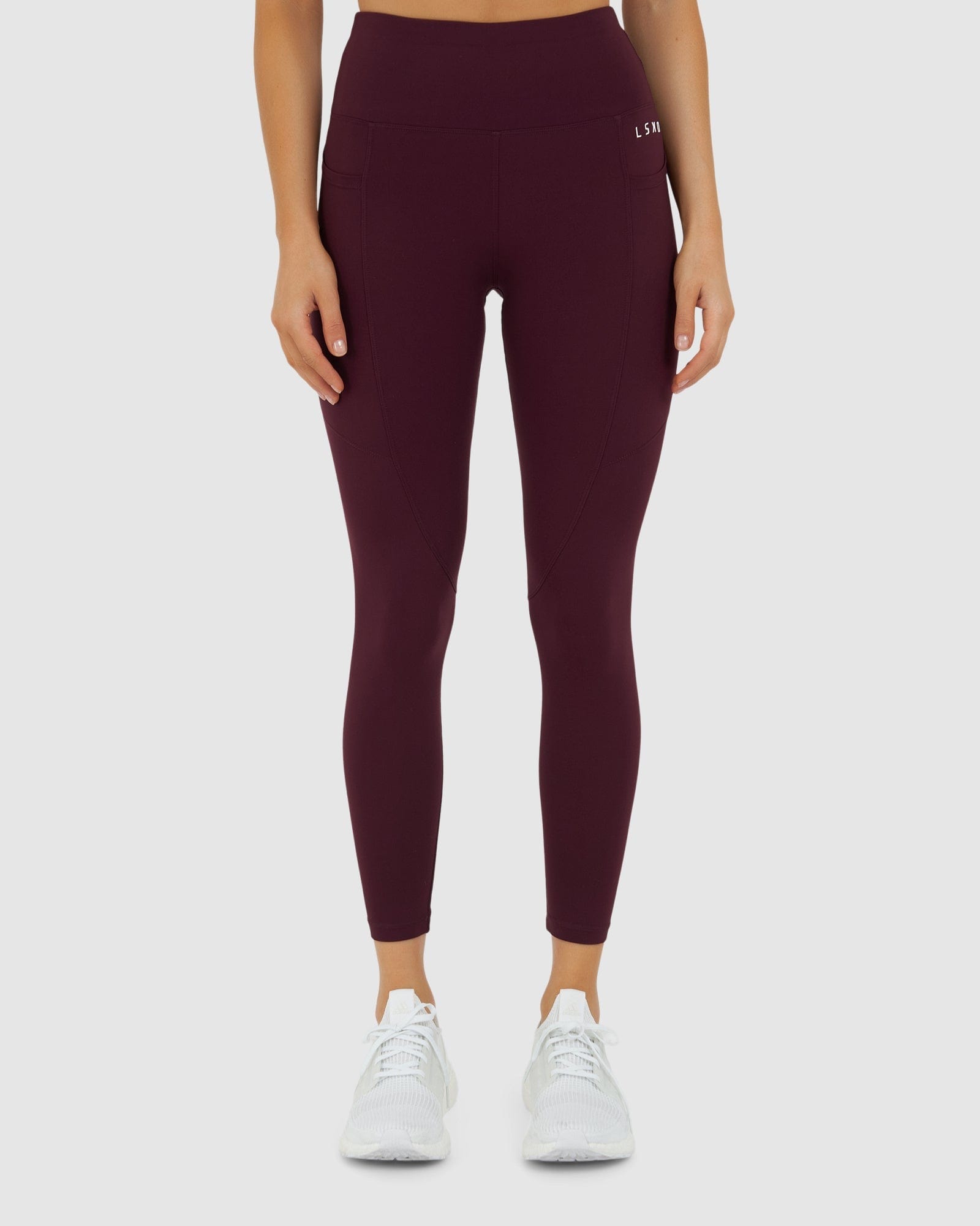 Model wearing Rep 7/8 Length Tight Small Logo - Wine