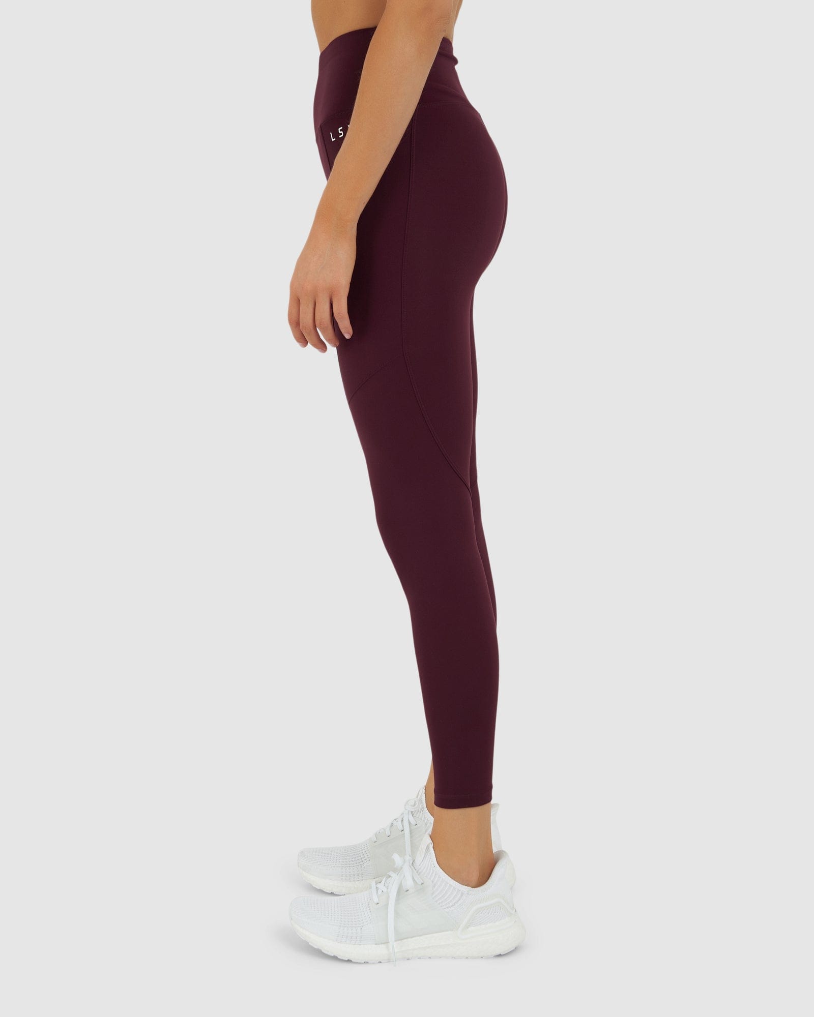Model wearing Rep 7/8 Length Tight Small Logo - Wine