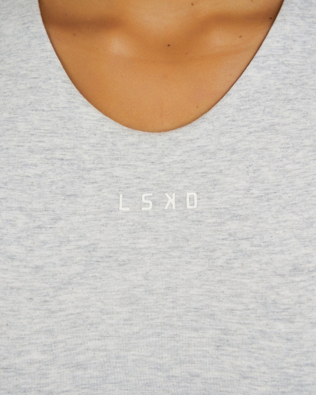 Model wearing Warm-Up Tank - Lt Grey Marle
