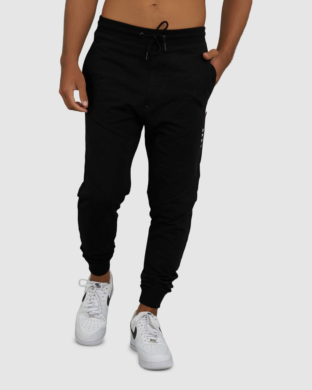 Model wearing Unisex Rep Jogger - Black