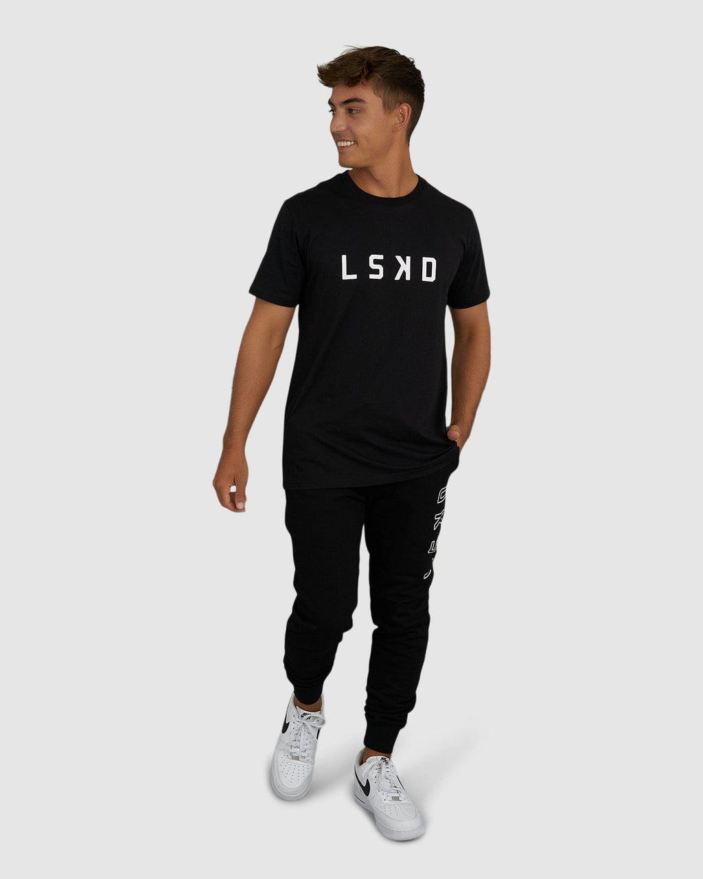 Model wearing Tidy Track Pant - Black