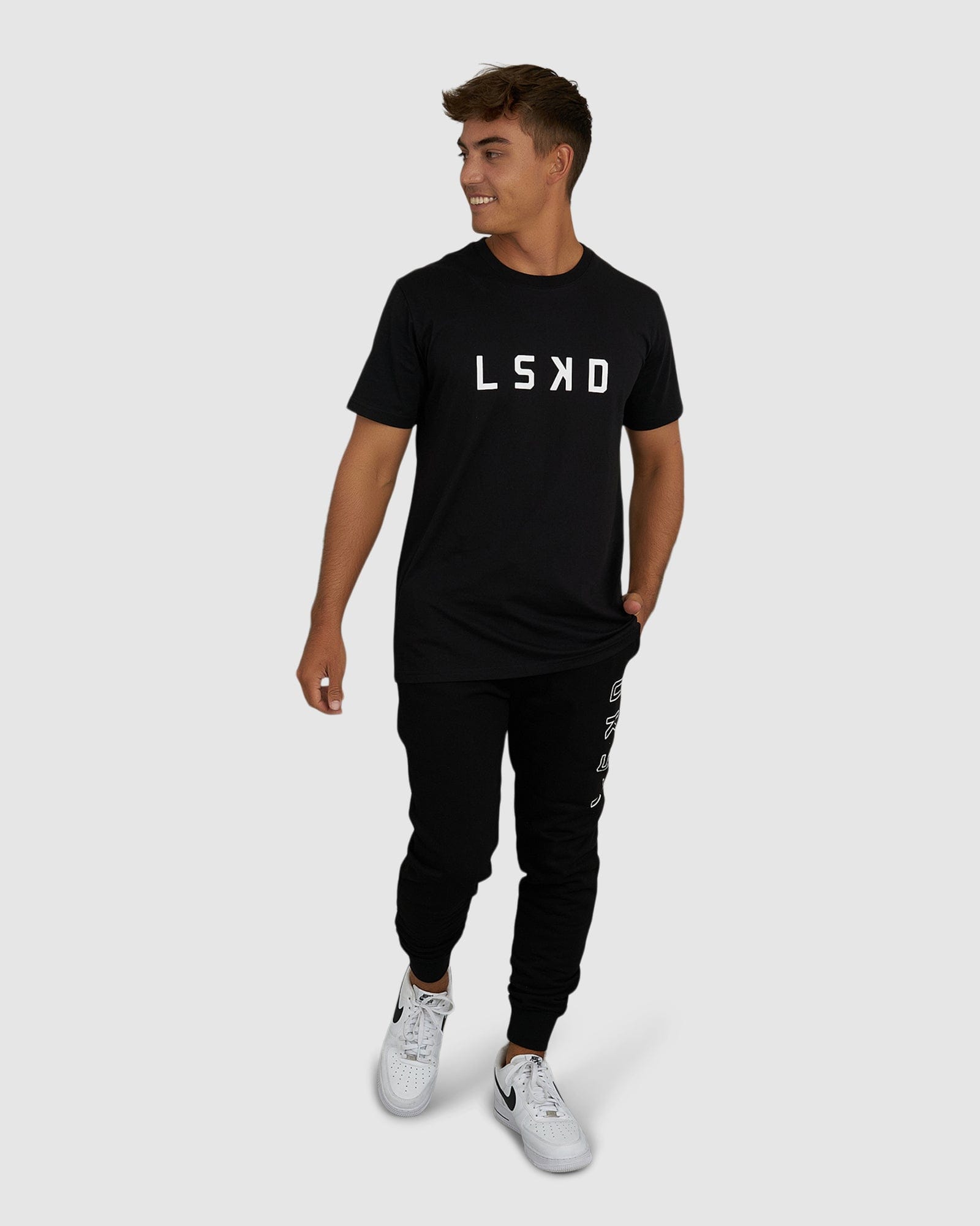 Model wearing Tidy Track Pant - Black