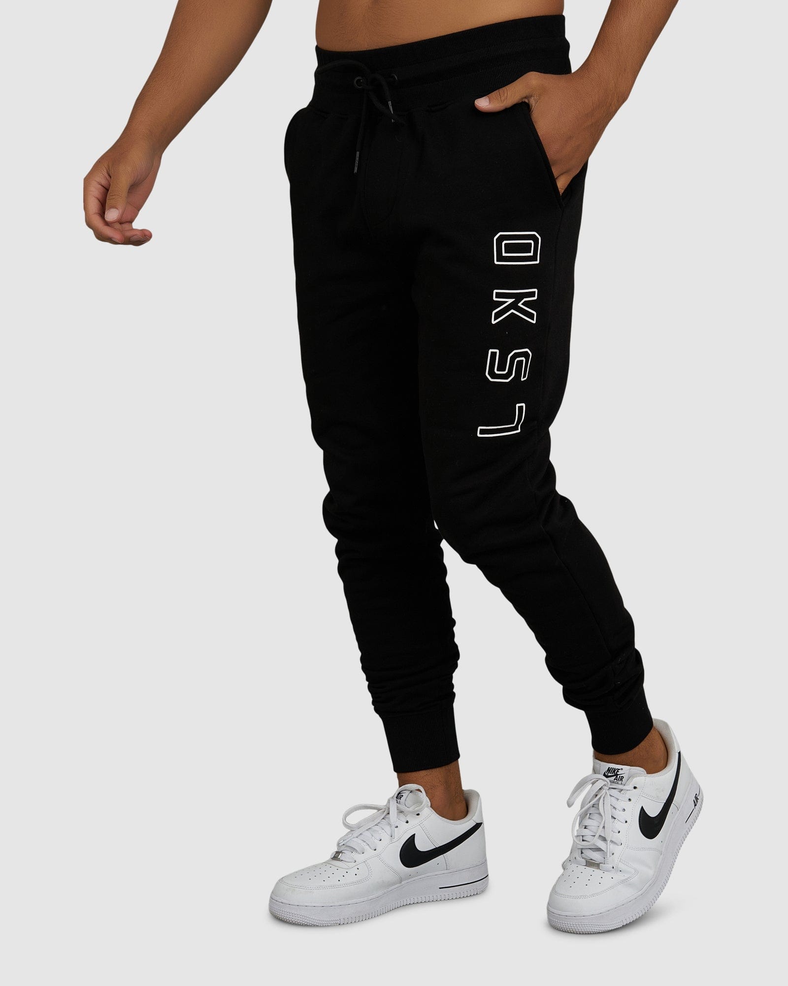 Model wearing Tidy Track Pant - Black