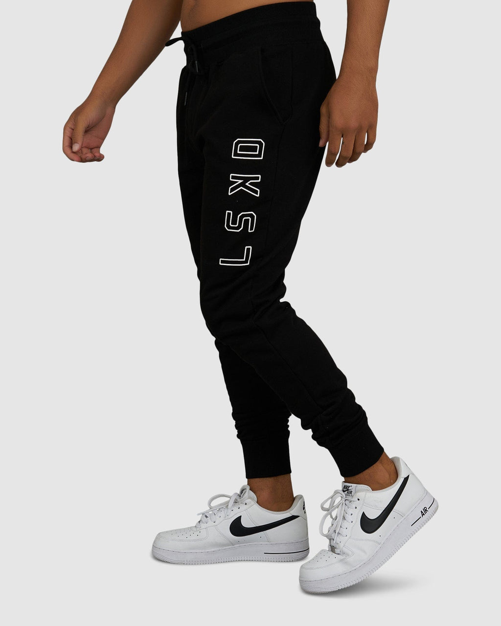 Model wearing Tidy Track Pant - Black