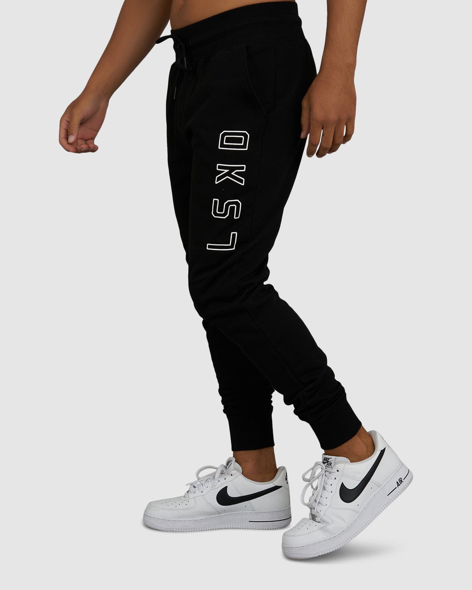 Model wearing Tidy Track Pant - Black