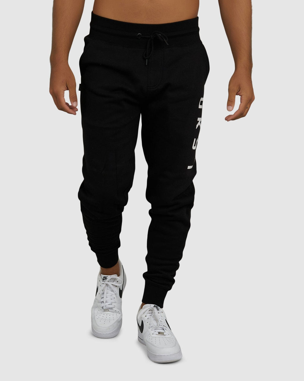 Model wearing Structure Track Pant - Black-White