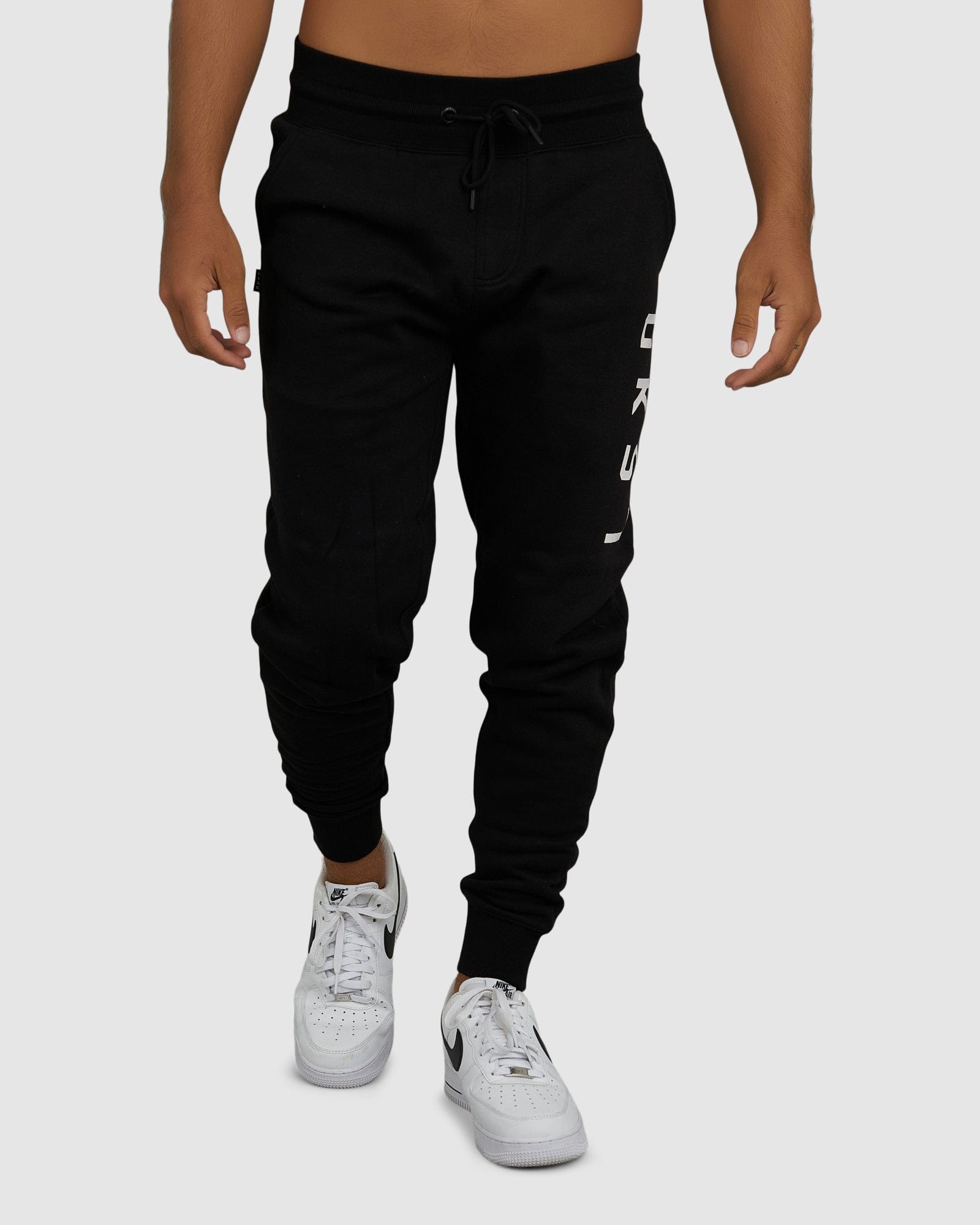 Model wearing Structure Track Pant - Black-White