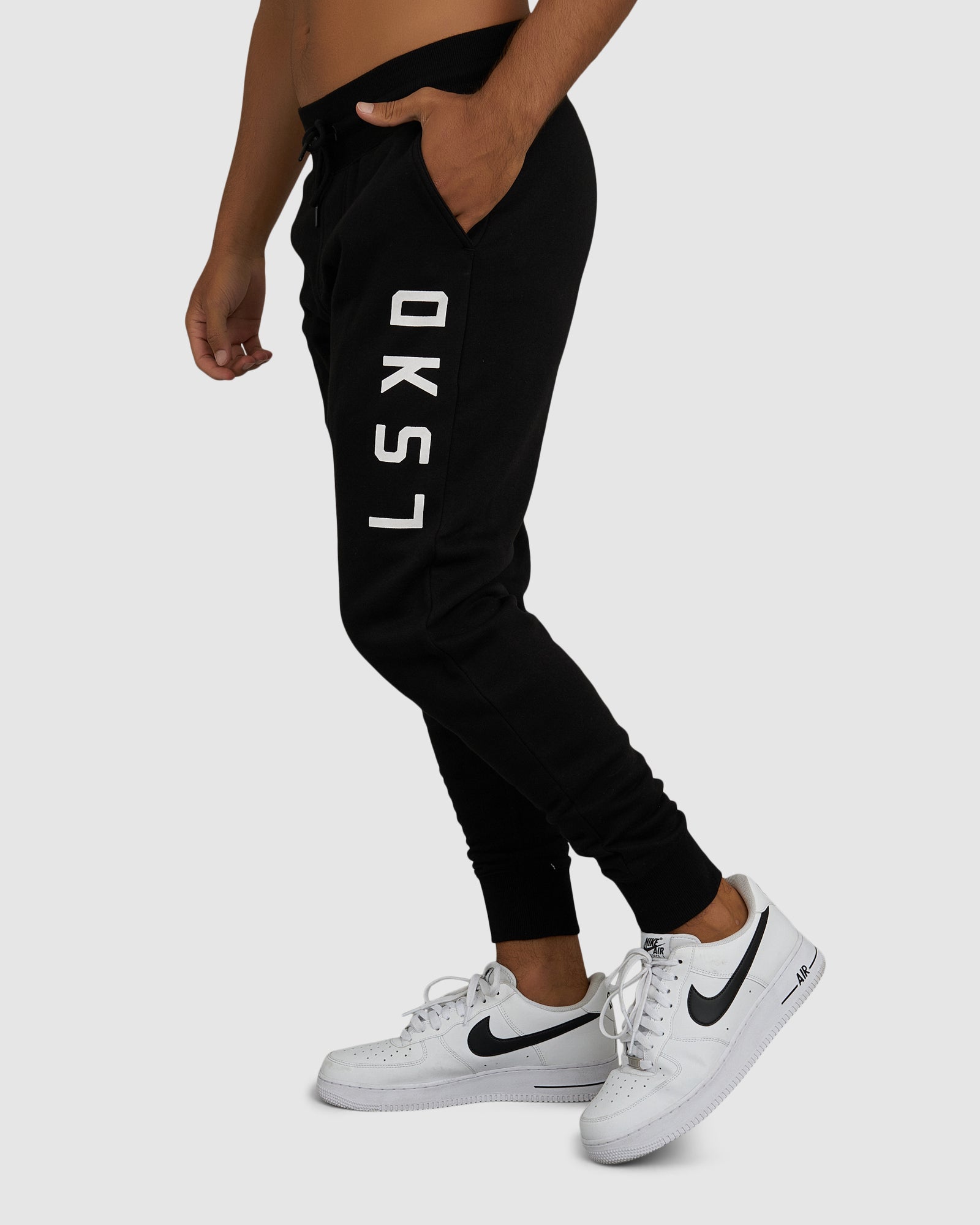 Model wearing Structure Track Pant - Black-White