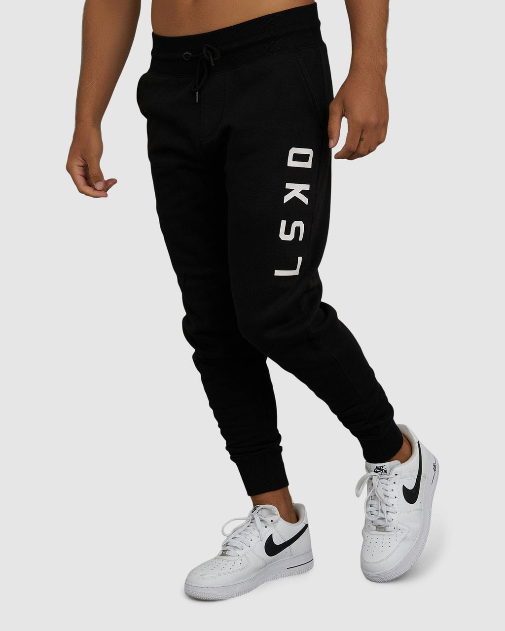 Model wearing Structure Track Pant - Black-White
