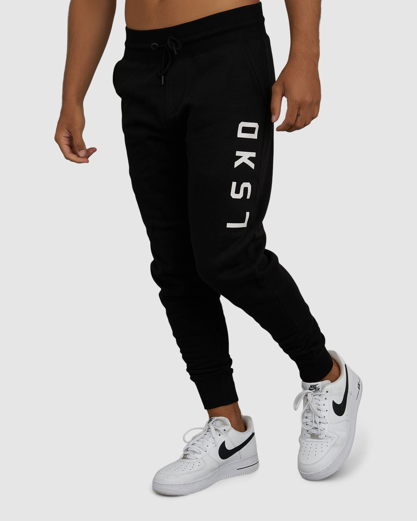 Model wearing Structure Track Pant - Black-White