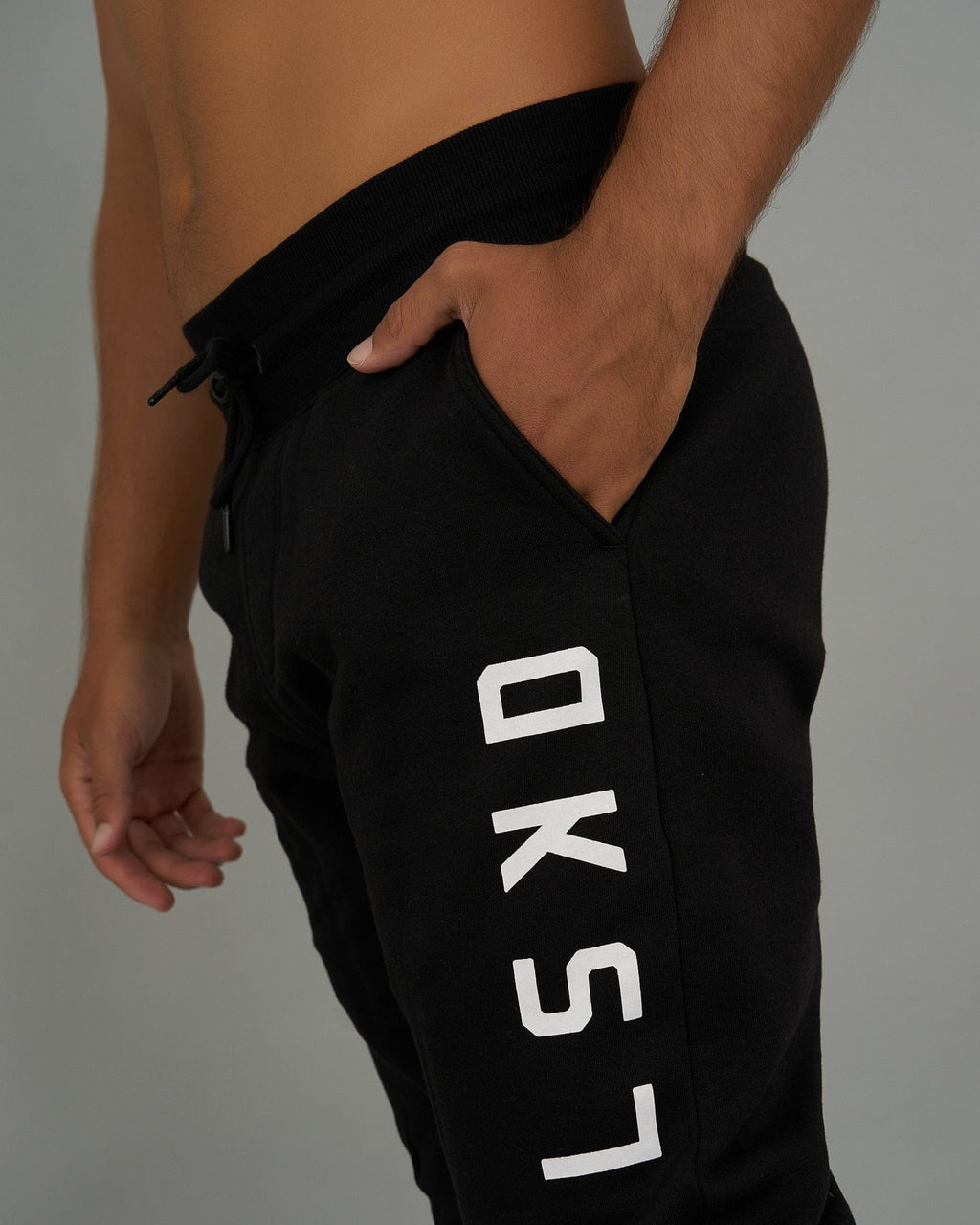 Model wearing Structure Track Pant - Black-White