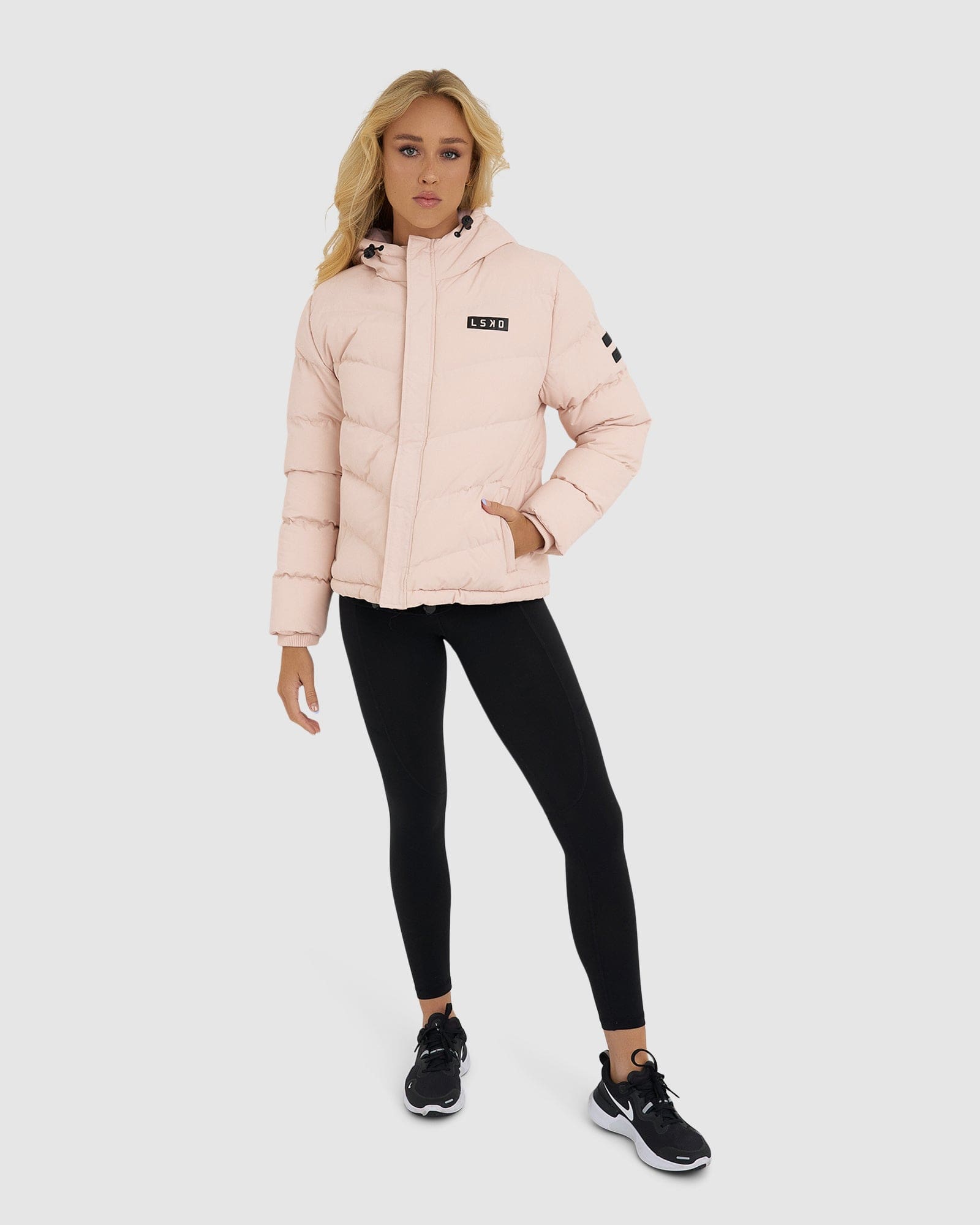 Model wearing Roasted Puffer Jacket 21 - Peach Whip